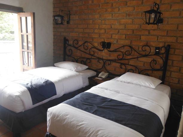 Imagen de la habitación del Hotel Casa Indigo. Foto 10