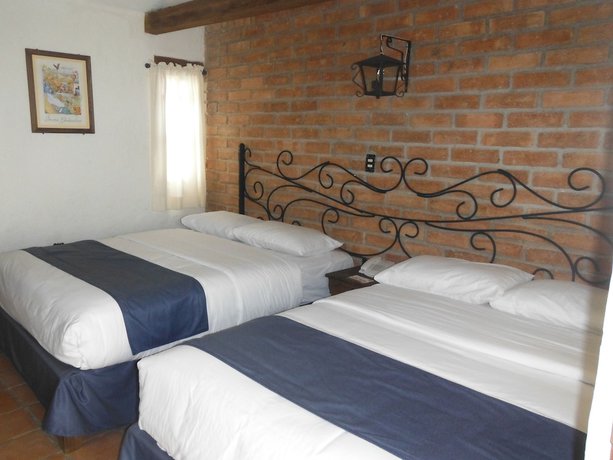 Imagen de la habitación del Hotel Casa Indigo. Foto 16