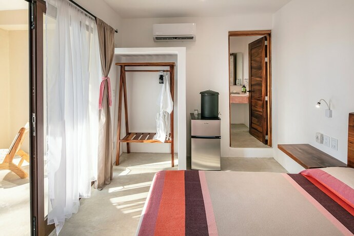 Imagen de la habitación del Hotel Casa Kuaa. Foto 16