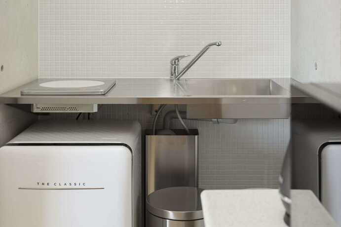 Imagen de la habitación del Hotel Casa Kyobashi. Foto 22