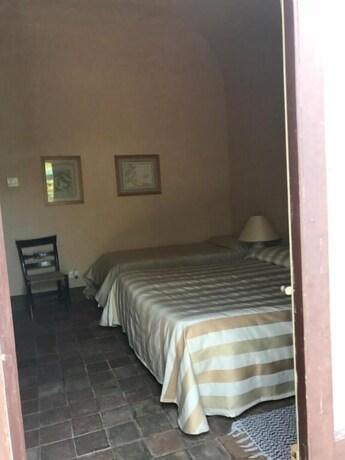 Imagen de la habitación del Hotel Casa La Carrubbazza. Foto 17