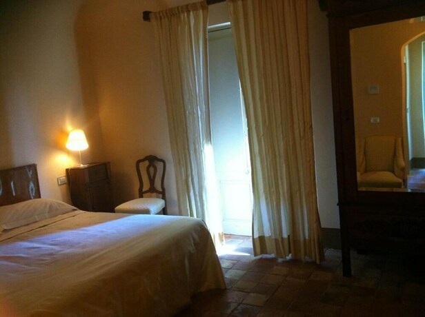 Imagen de la habitación del Hotel Casa La Carrubbazza. Foto 25