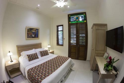 Imagen de la habitación del Hotel Casa La Fe By Bespokecolombia. Foto 9