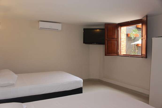 Imagen de la habitación del Hotel Casa La Fleur. Foto 15