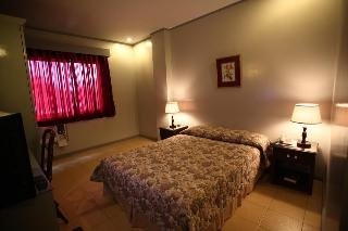 Imagen de la habitación del Hotel Casa Leticia Business Inn. Foto 11