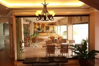 Imagen del bar/restaurante del Hotel Casa Leticia Business Inn. Foto 7