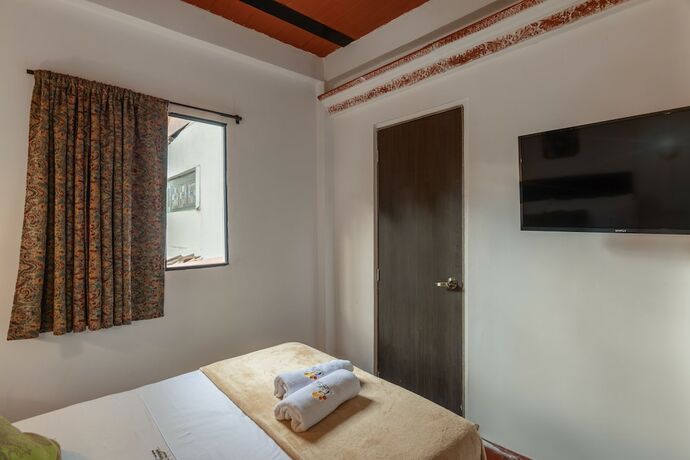 Imagen de la habitación del Hotel Casa Los Naranjos Hostal. Foto 13