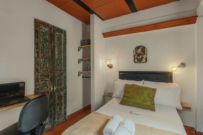 Imagen de la habitación del Hotel Casa Los Naranjos Hostal. Foto 14
