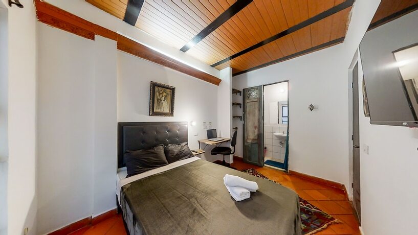 Imagen de la habitación del Hotel Casa Los Naranjos Hostal. Foto 15