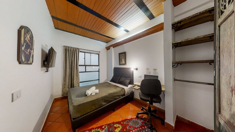Imagen de la habitación del Hotel Casa Los Naranjos Hostal. Foto 16