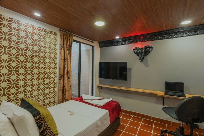 Imagen de la habitación del Hotel Casa Los Naranjos Hostal. Foto 17