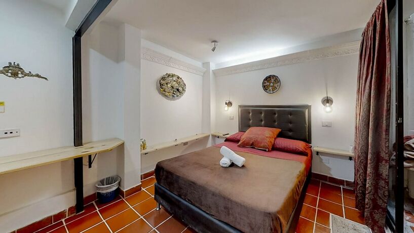 Imagen de la habitación del Hotel Casa Los Naranjos Hostal. Foto 19