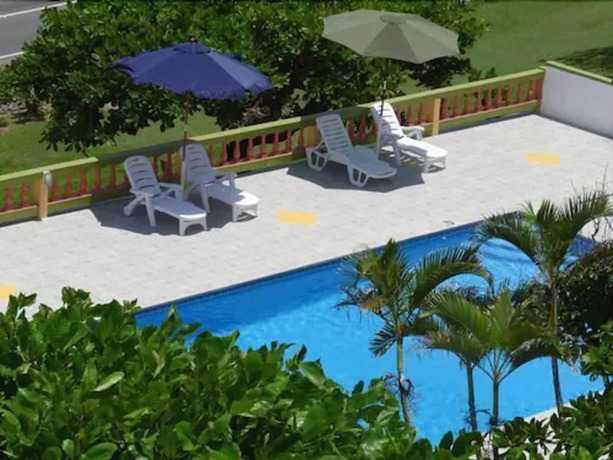 Imagen de la piscina del Hotel Casa Maria, Little Bay. Foto 18