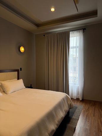 Imagen de la habitación del Hotel Casa M&auml;di boutique. Foto 13