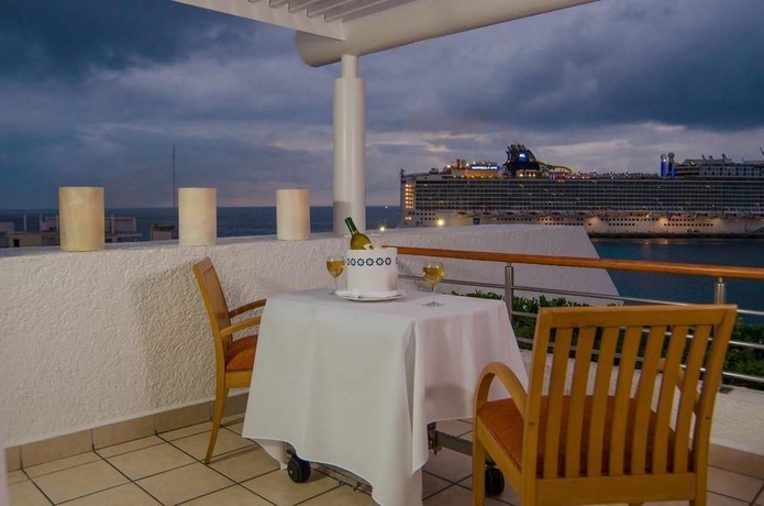 Imagen de la habitación del Hotel Casa Mexicana Cozumel. Foto 5