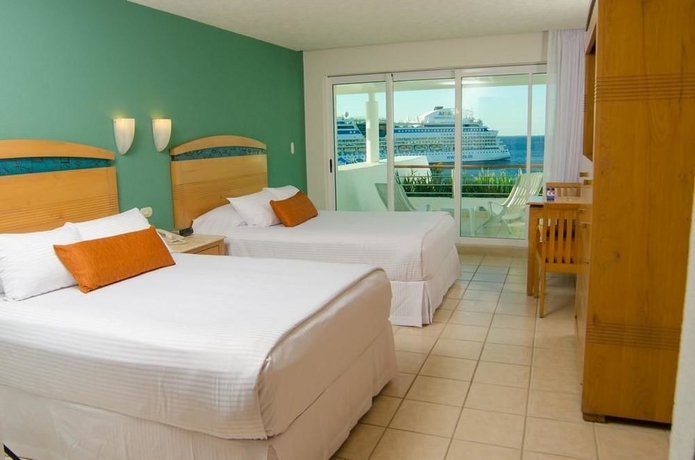 Imagen de la habitación del Hotel Casa Mexicana Cozumel. Foto 7