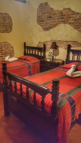 Imagen de la habitación del Hotel Casa Mia, Antigua Guatemala. Foto 9