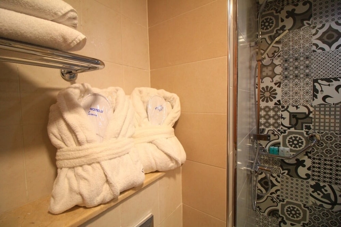 Imagen de la habitación del Hotel Casa Mia Family Suite. Foto 13
