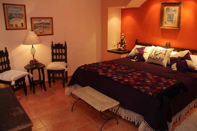 Imagen de la habitación del Hotel Casa Mia Suites. Foto 10