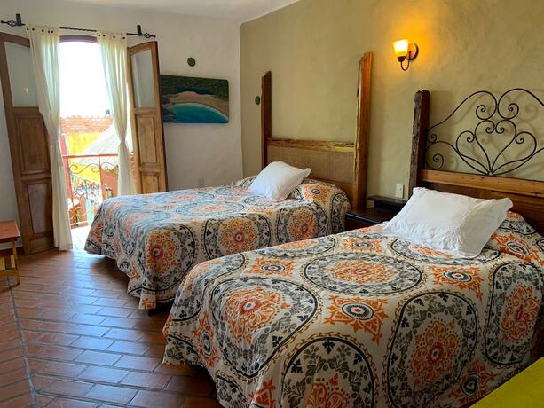 Imagen de la habitación del Hotel Casa Miguel Arcangel. Foto 12