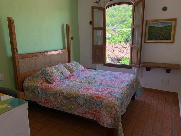 Imagen de la habitación del Hotel Casa Miguel Arcangel. Foto 13