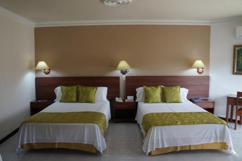 Imagen de la habitación del Hotel Casa Morales Internacional Y Centro De Convenciones. Foto 7