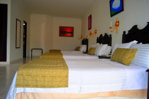 Imagen de la habitación del Hotel Casa Morales Internacional Y Centro De Convenciones. Foto 8