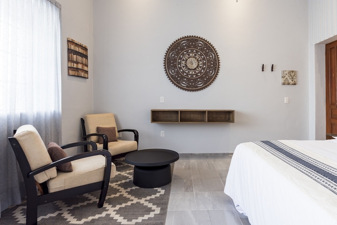 Imagen de la habitación del Hotel Casa Murmullos. Foto 11
