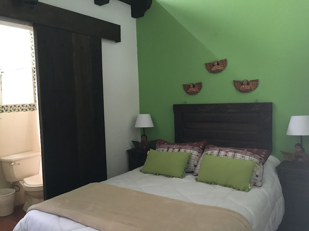 Imagen de la habitación del Hotel Casa Naranjo. Foto 13