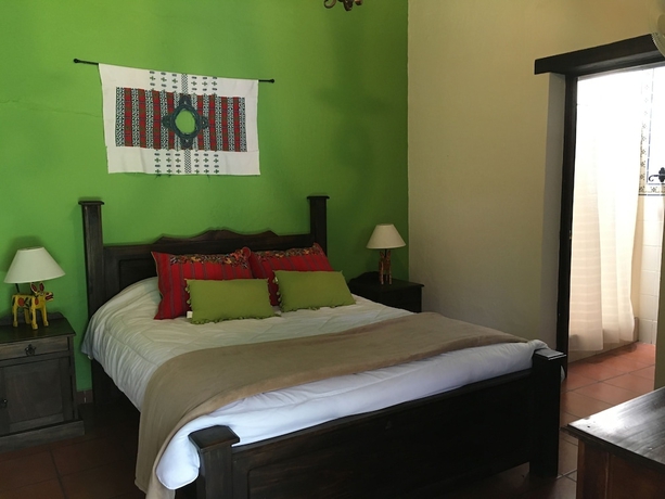 Imagen de la habitación del Hotel Casa Naranjo. Foto 16