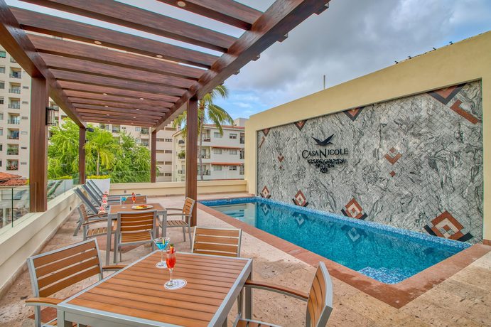 Imagen de la piscina del Hotel Casa Nicole Boutique. Foto 20