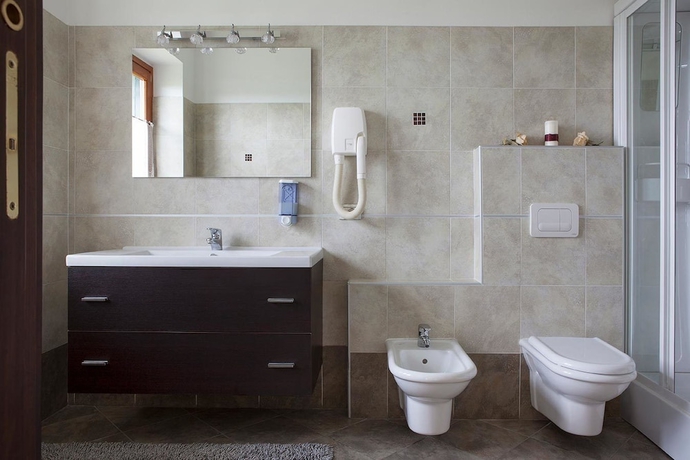 Imagen de la habitación del Hotel Casa Nicolini Albergo Ristorante. Foto 17