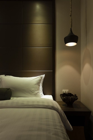 Imagen de la habitación del Hotel Casa Nithra Bangkok. Foto 2