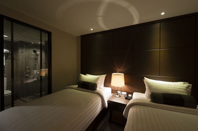 Imagen de la habitación del Hotel Casa Nithra Bangkok. Foto 6