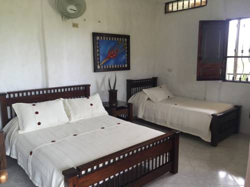 Imagen de la habitación del Hotel Casa Nogales Bosques Del Saman. Foto 2