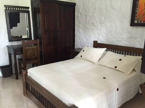 Imagen de la habitación del Hotel Casa Nogales Bosques Del Saman. Foto 3