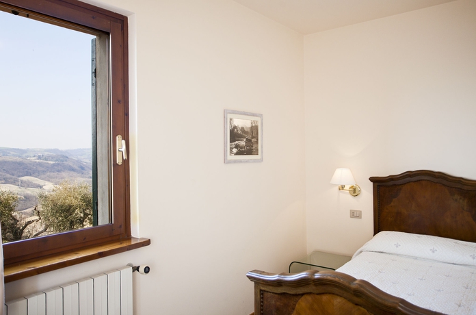 Imagen de la habitación del Hotel Casa Oliva Borgo del Benessere delle Marche. Foto 5