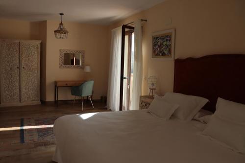 Imagen de la habitación del Hotel Casa Palacio Conde Del Álamo. Foto 19