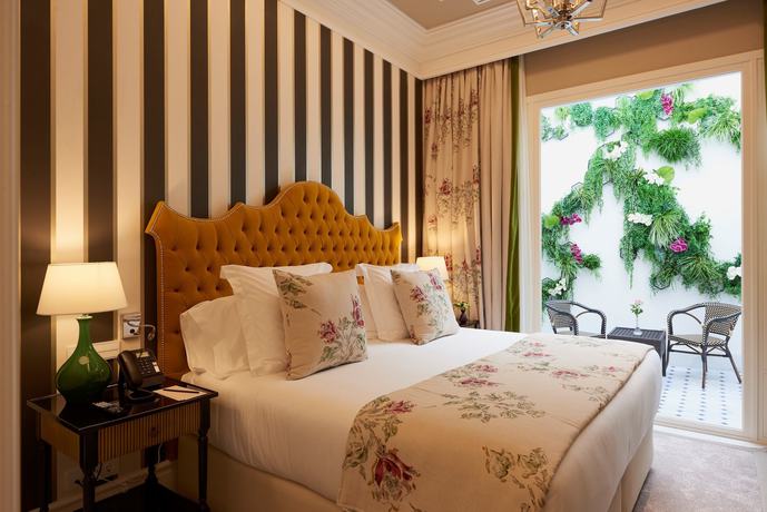 Imagen de la habitación del Hotel Casa Palacio María Luisa. Foto 3