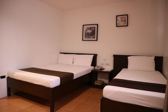 Imagen de la habitación del Hotel Casa Palmeras. Foto 2