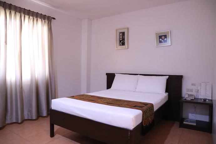 Imagen de la habitación del Hotel Casa Palmeras. Foto 10