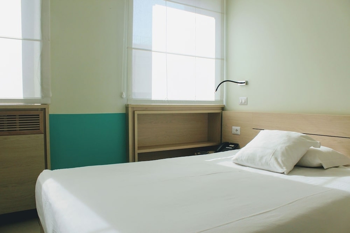 Imagen de la habitación del Hotel Casa Per Ferie Domus Helena. Foto 4