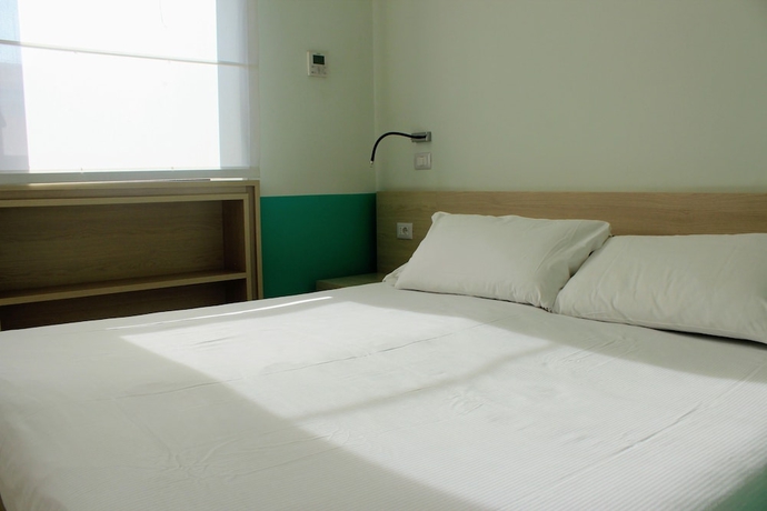 Imagen de la habitación del Hotel Casa Per Ferie Domus Helena. Foto 13