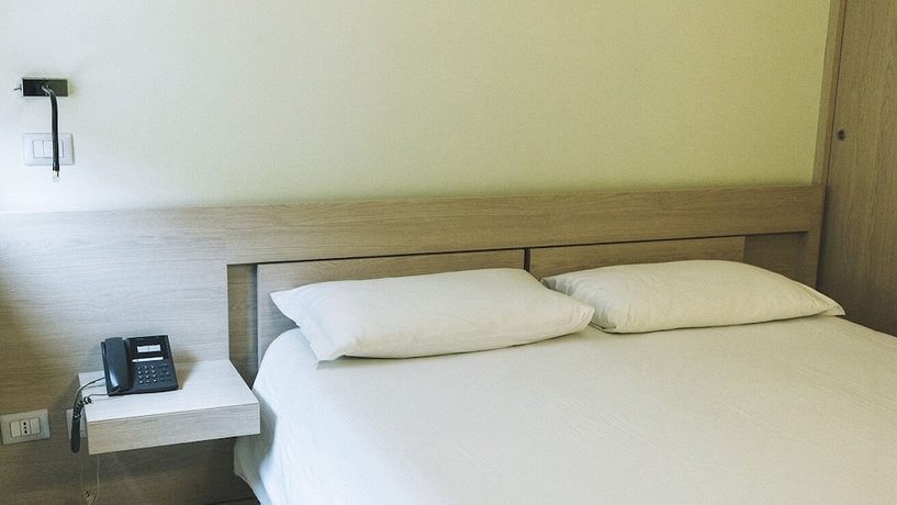 Imagen de la habitación del Hotel Casa Per Ferie Domus Helena. Foto 16