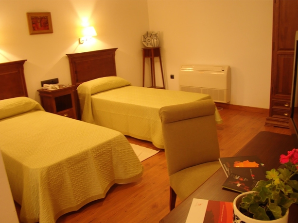 Imagen de la habitación del Hotel Casa Pizarro, Cáceres. Foto 3