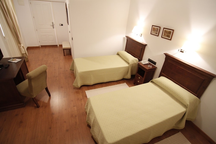 Imagen de la habitación del Hotel Casa Pizarro, Cáceres. Foto 10