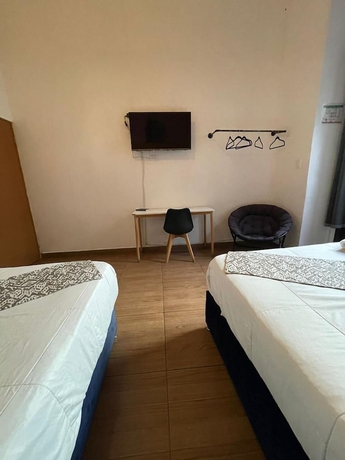 Imagen de la habitación del Hotel Casa Puebla. Foto 6