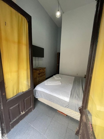 Imagen de la habitación del Hotel Casa Puebla. Foto 10