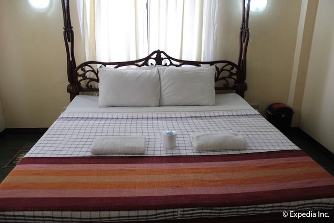 Imagen de la habitación del Hotel Casa Rica Hotel. Foto 12