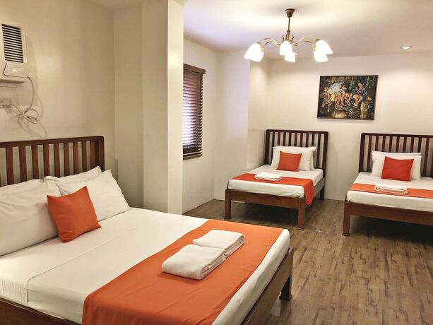 Imagen de la habitación del Hotel Casa Roces Bed And Breakfast. Foto 26